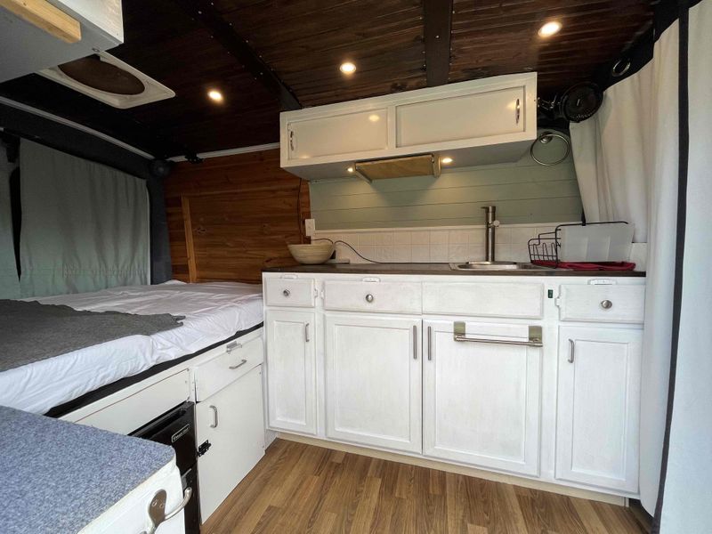 Picture 4/22 of a 2017 Ford Transit Camper Van RV w/400w solar for sale in Oviedo, Florida