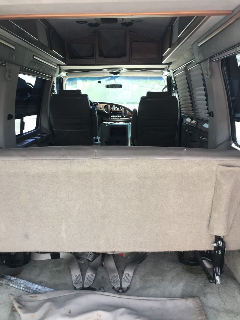 Picture 2/21 of a Unique Ford E 250 converted by Tuscani High Top 4x4 for sale in Hallandale, Florida