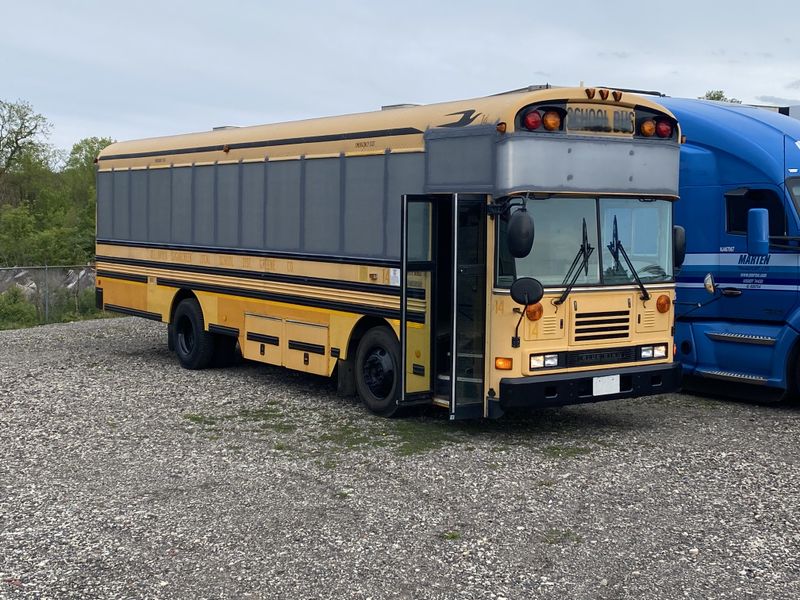 Picture 5/33 of a 2005 all American bluebird Skoolie with 20 inch roof raise for sale in Hendersonville, North Carolina