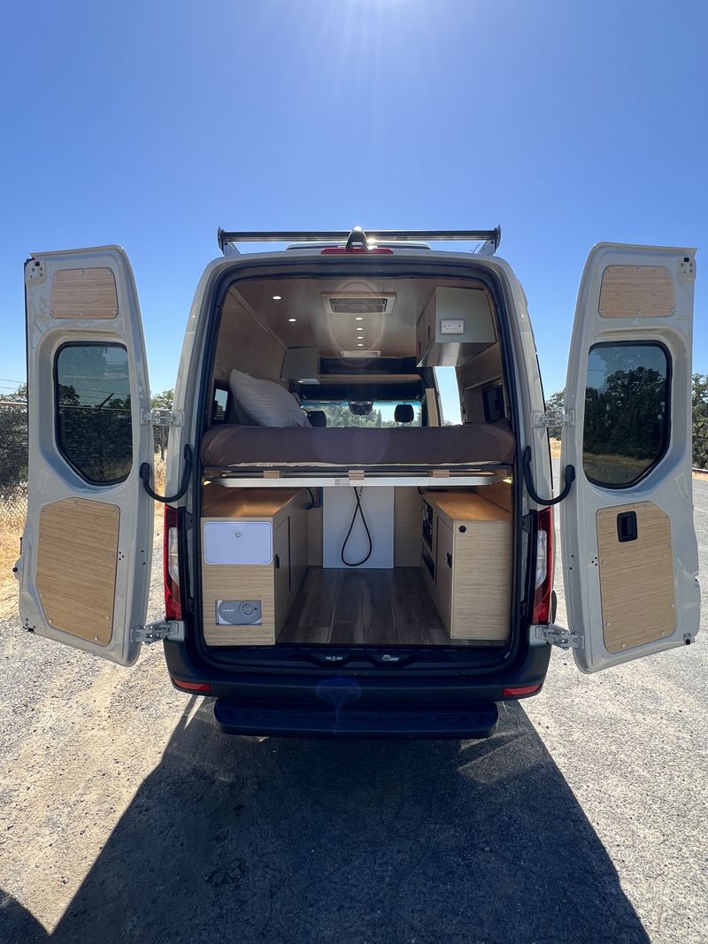 Picture 4/6 of a AWD Sprinter New Conversion - AC, Heater, Shower, Queen Bed for sale in Rancho Cordova, California