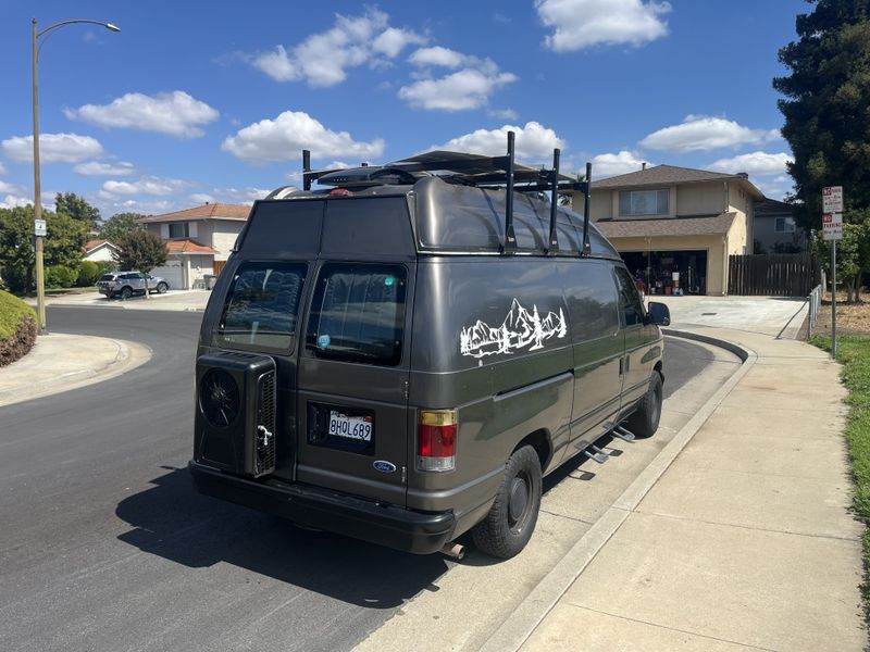 Picture 5/18 of a 1995 Ford E150 medium top for sale in San Jose, California