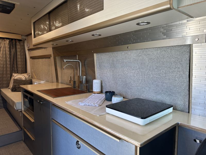 Picture 3/10 of a 2020 Ford Transit AWD Luxury Camper Van for sale in Wheeler, Michigan