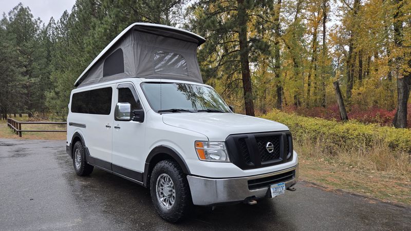 Picture 3/28 of a 2012 Nissan NV3500 HD Roadtrek Pop Top Camper Van for sale in Missoula, Montana