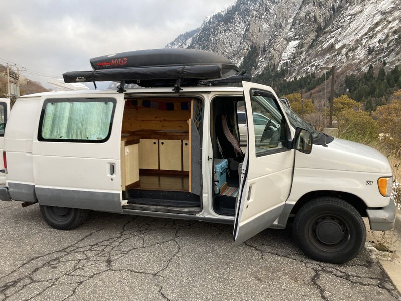 Picture 2/13 of a 1999 Ford E-150 - 15k on rebuilt engine for sale in Salt Lake City, Utah