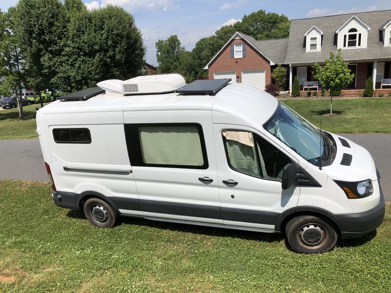 Picture 1/14 of a 2017 Ford transit 150 Med Roof 44,600 miles for sale in Asheville, North Carolina