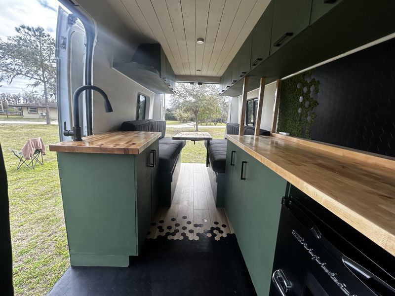 Picture 1/20 of a 2019 ram promoter off grid camper for sale in Tampa, Florida
