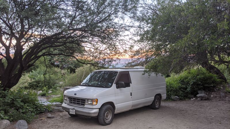 Picture 1/17 of a 1995 Ford E-150, "La Vaca Blanca" 🐮 :) for sale in Raleigh, North Carolina
