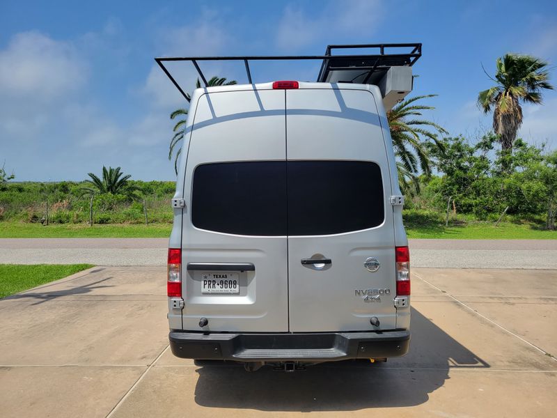 Picture 4/22 of a Nissan NV 3500 HD High Roof 4x4 Van Conversion for sale in Galveston, Texas