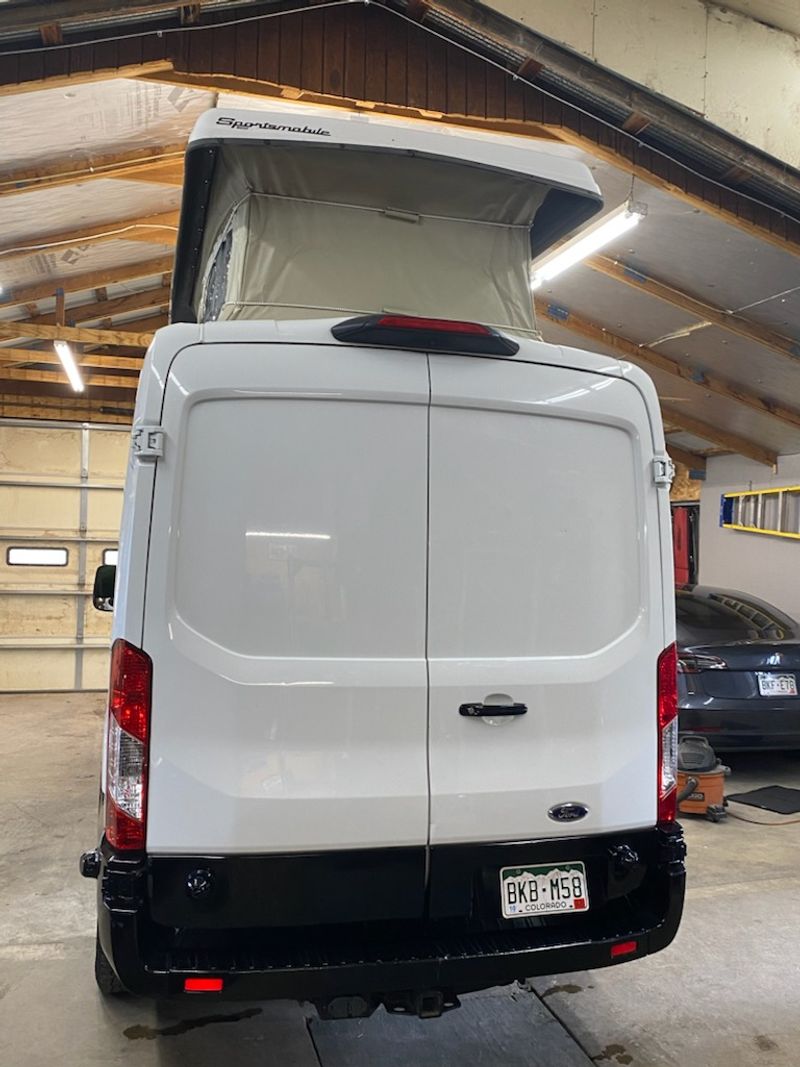 Picture 2/8 of a 2018 Ford T250 Camper Van with pop-up sleeper/camper top for sale in Berthoud, Colorado