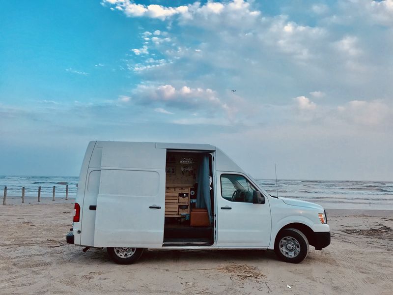 Picture 1/20 of a 2012 Nissan NV High Roof for sale in Denver, Colorado