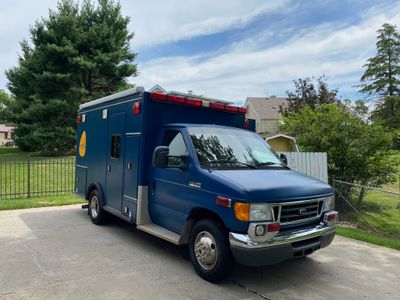 Photo of a Ambulance Camper Conversion for sale: "Nessie" - Ford E-350 - Campulance - Off-Grid & Open Concept