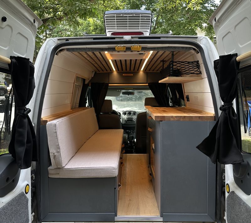 Picture 1/18 of a 2013 Ford Transit Connect XLT (Professional Conversion) for sale in Raleigh, North Carolina