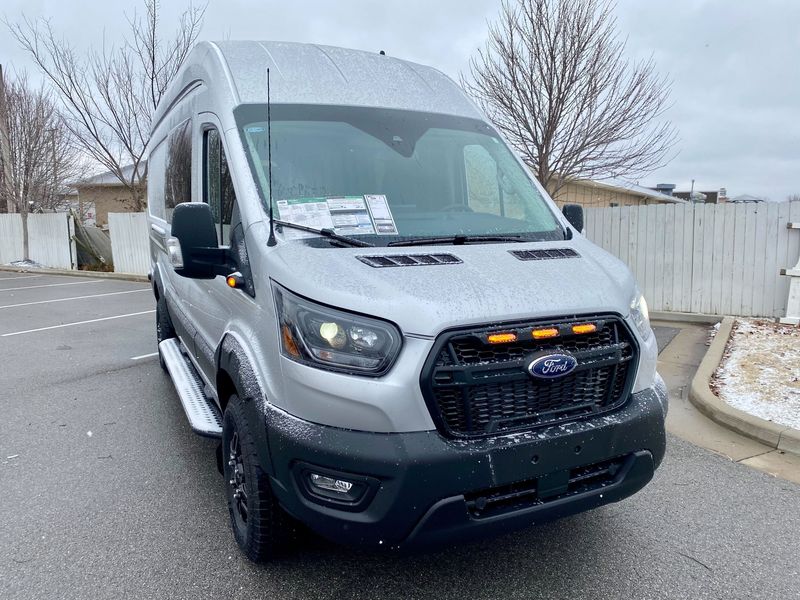 Picture 3/5 of a 2023 Ingot Silver Ford Transit 350 Trail High-Roof AWD for sale in Fayetteville, Arkansas