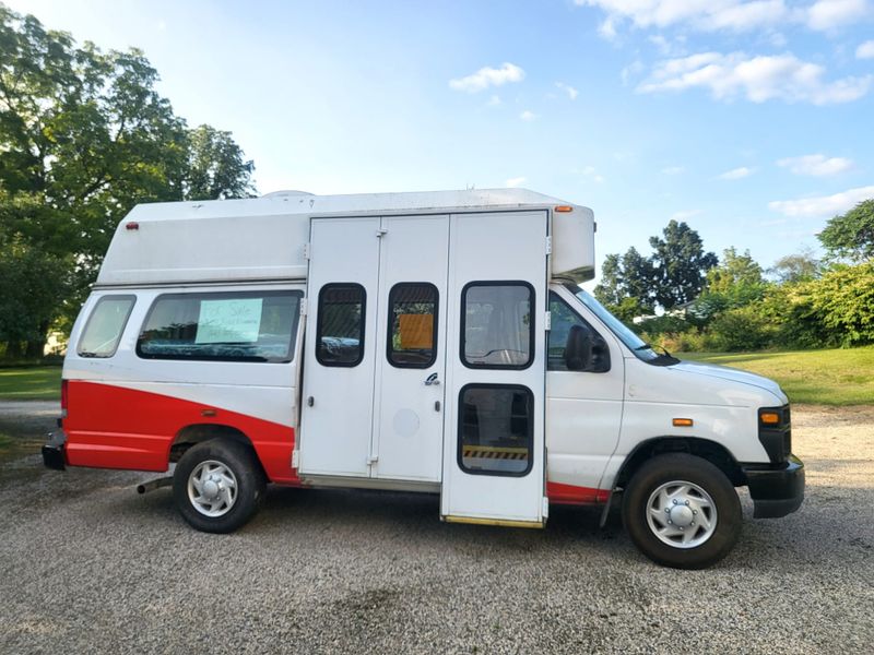 Picture 1/8 of a 2014 Ford E350 for sale in Rockford, Michigan