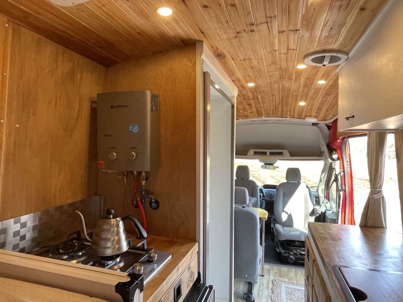 Picture 4/18 of a 2015 Ford Transit High Roof with hot shower, seats 4! for sale in Maynard, Massachusetts
