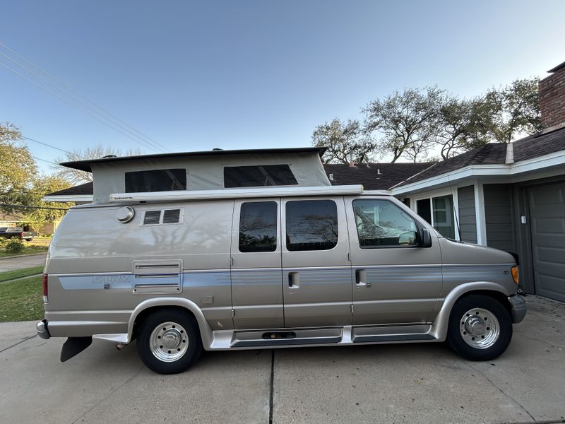 Picture 4/27 of a Grand Touring GTRV Ford E350 pop-up camper van for sale in Houston, Texas