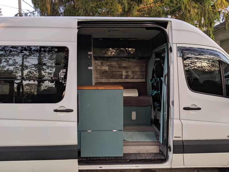 Picture 3/13 of a Large Mercedes sprinter van with toilet and solar and sink for sale in Traverse City, Michigan
