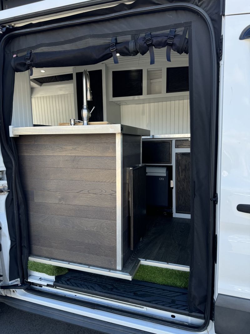 Picture 3/15 of a PRICE REDUCED - 2016 Ford Transit 250 Mid Roof Low Miles  for sale in Traverse City, Michigan