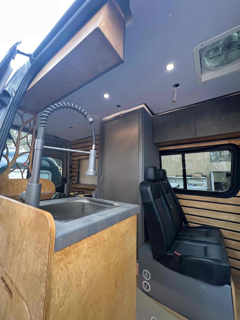 Picture 1/12 of a 4x4 144 Premium Sprinter with electric bed, sits/sleeps 4 for sale in Big Bear City, California