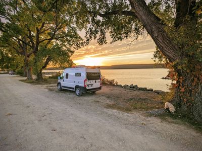 Photo of a Camper Van for sale: Solar- off grid AC and heat- Explore in Comfort Year-Round!