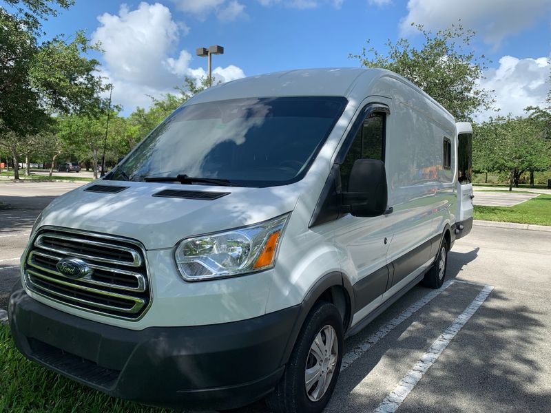 Picture 1/13 of a 2015 Ford Transit 150 Medium Roof  Self Converted w/ SOLAR  for sale in Fort Lauderdale, Florida