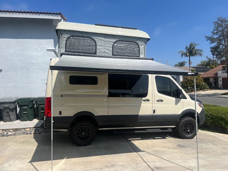 Picture 1/45 of a 2021 4WD Sprinter High Roof Pop Top 5k miles LIKE NEW for sale in San Diego, California