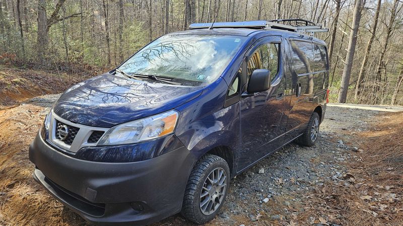 Picture 2/9 of a 2014 Nissan micro camper with solar for sale in East Flat Rock, North Carolina