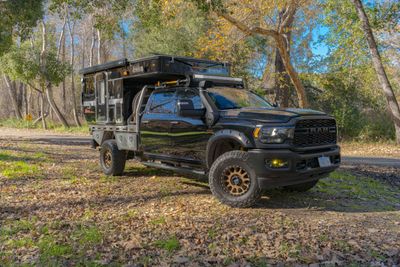 Photo of a Truck Camper for sale: **PRICE REDUCED** 23 Ram Turbo Diesel + FWC HAWK Camper