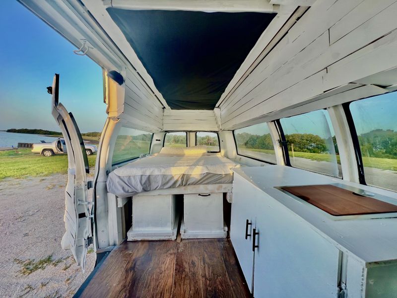 Picture 5/12 of a Boho Dream SKYLIGHT High Top Chevy Express for sale in Saint Petersburg, Florida