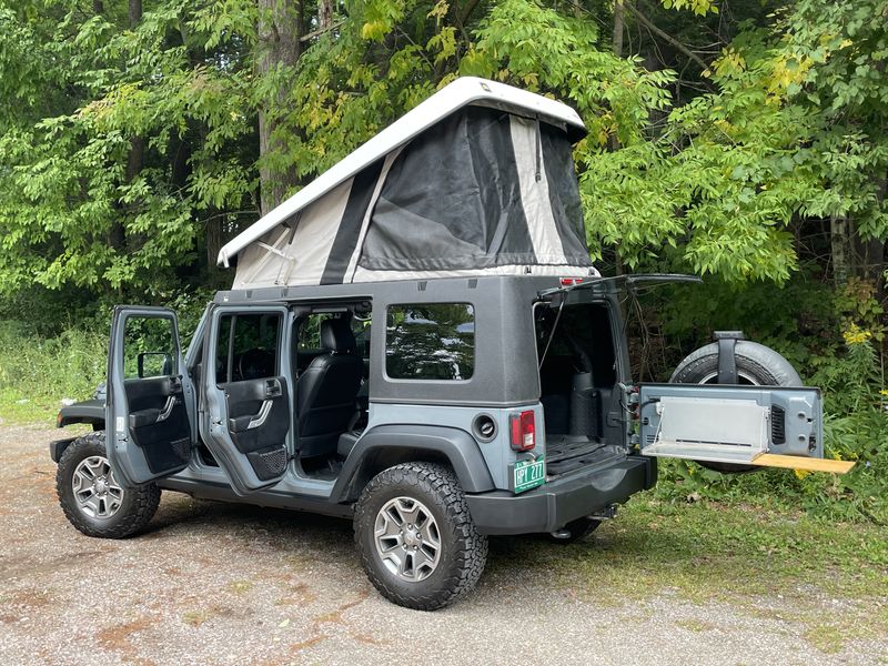 Picture 1/7 of a 2015 Jeep Rubicon with installed Ursa Minor Pop-Top for sale in Burlington, Vermont