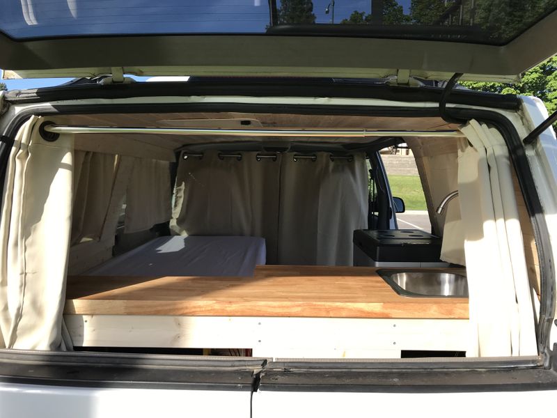 Picture 4/12 of a Newly Converted 2002 AWD Chevy Astro Camper for sale in Coeur d'Alene, Idaho