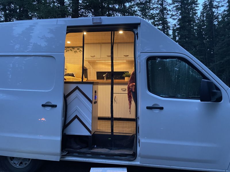 Picture 1/12 of a 2013 Nissan nv2500 campervan for sale in East Glacier Park, Montana