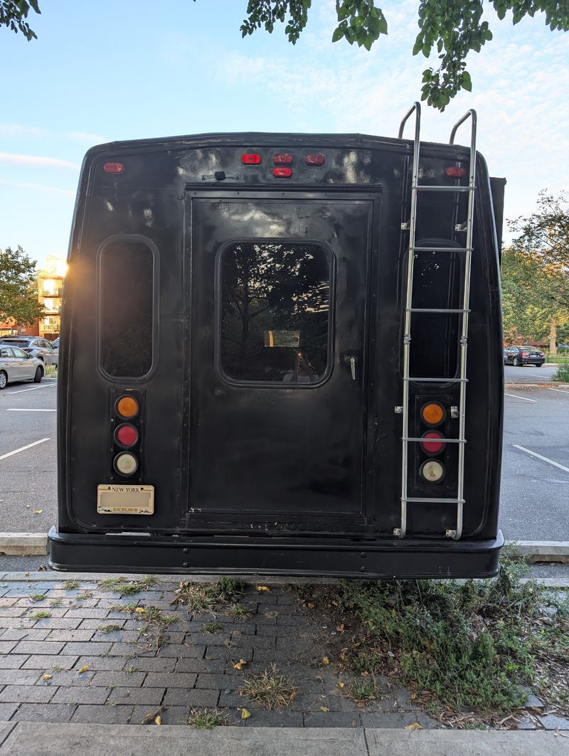Picture 5/9 of a 1999 Ford E-350 Shuttle Bus Skoolie Conversion – Turnkey for sale in Corona, New York