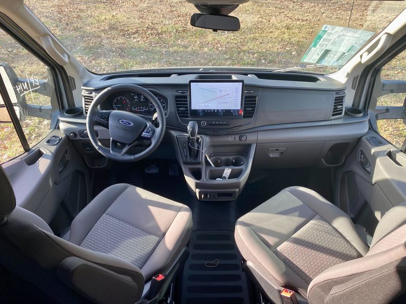 Picture 4/5 of a 2023 NEW Avalanche Gray AWD Ford Transit 250 High-Roof for sale in Fayetteville, Arkansas