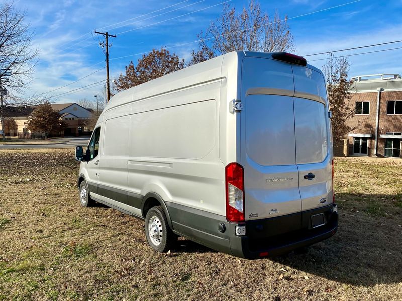 Picture 3/5 of a 2023 NEW Ingot Silver AWD Ford Transit 250 High-Roof EXT for sale in Fayetteville, Arkansas