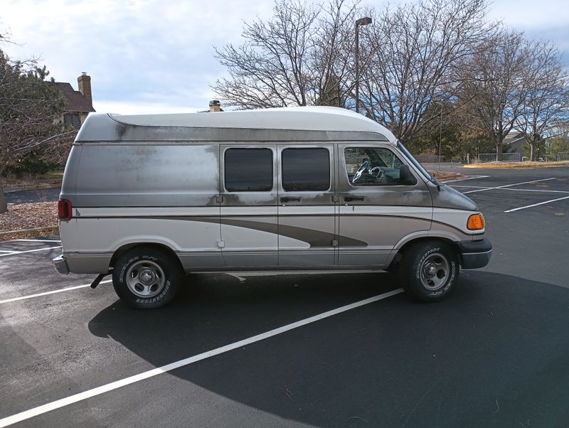 Picture 4/23 of a 2003 Dodge 1500 low miles with handicap lift for sale in Lone Tree, Colorado