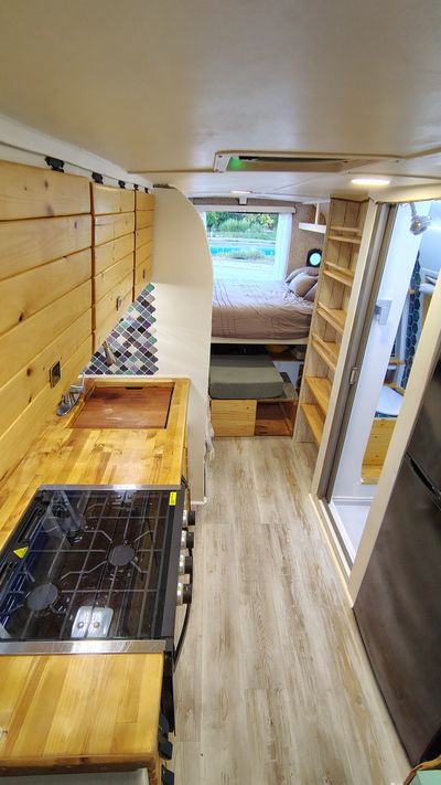 Photo of a Bus Conversion Camper for sale: 2003 Ford E-450 7.3L Turbo Diesel
