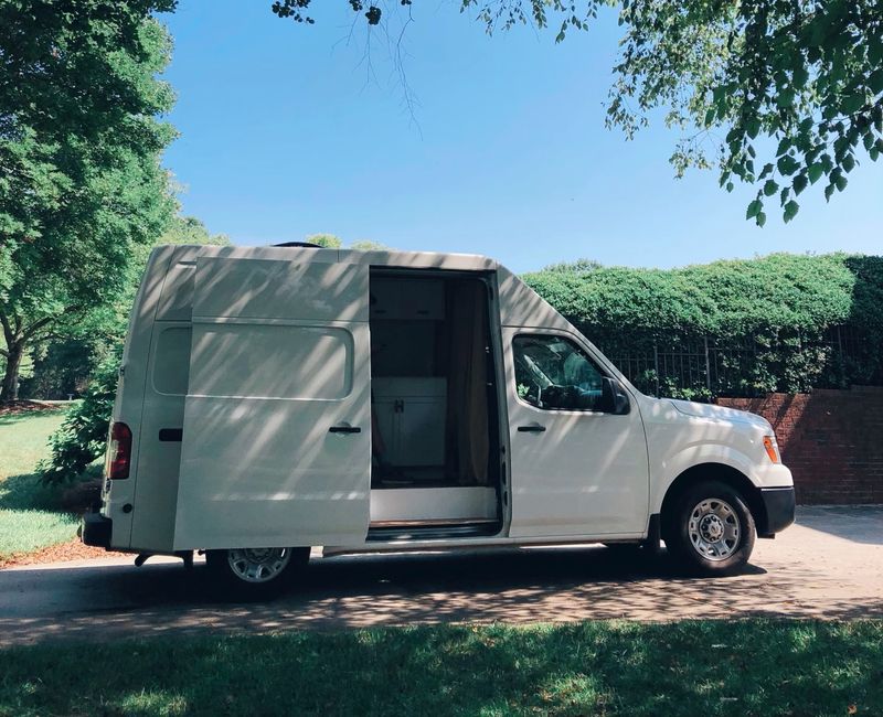 Picture 1/23 of a 2017 Nissan NV 2500 High Roof Camper Van Conversion for sale in Winston-Salem, North Carolina