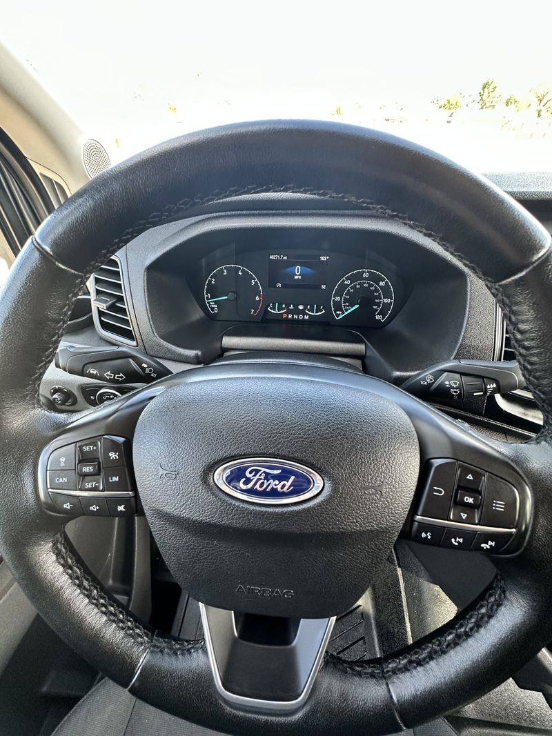 Picture 5/8 of a 2021 Ford transit crew awd ecoboost low miles for sale in Longmont, Colorado
