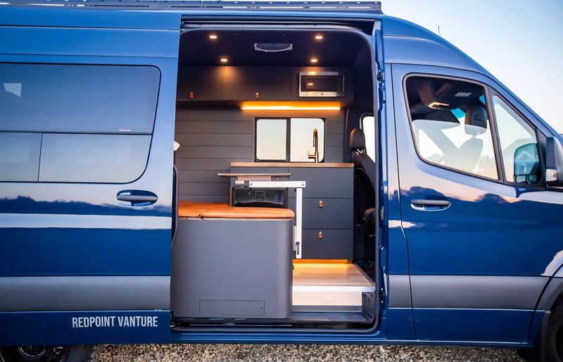 Picture 1/20 of a 2023 Luxury Mercedes Sprinter 144" Blue for sale in Salt Lake City, Utah