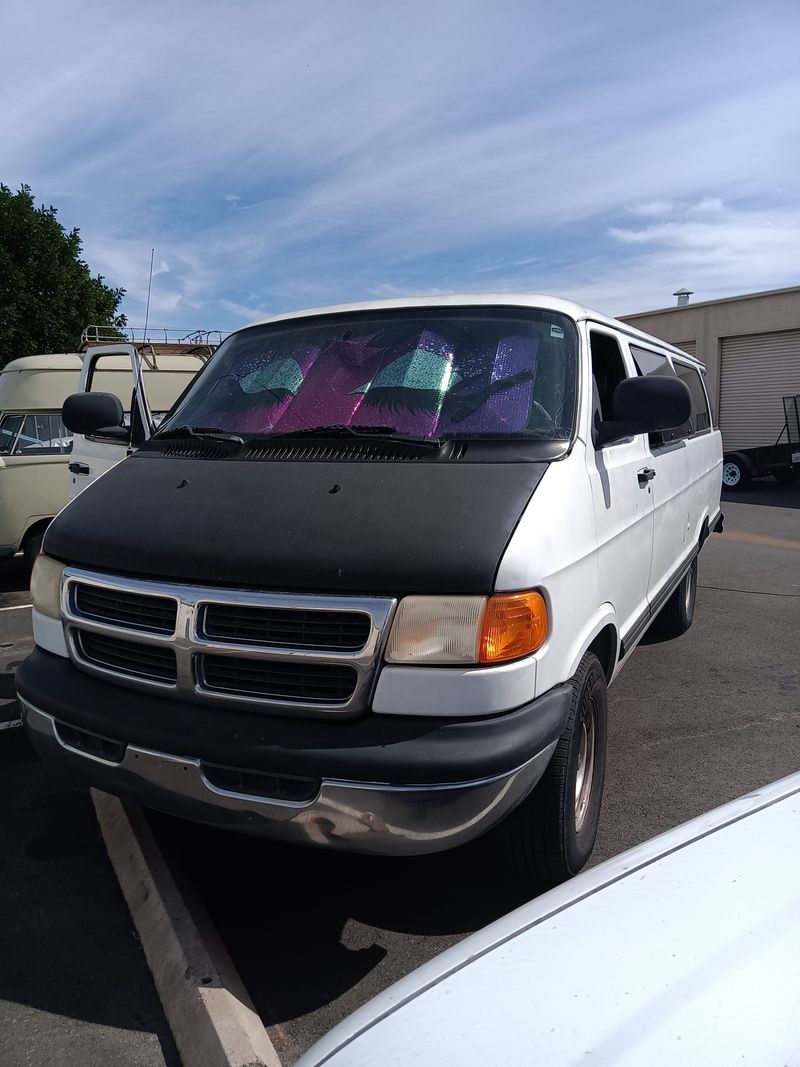 Picture 1/10 of a 2001 Chevy wagon converted with queen bed for sale in El Cajon, California