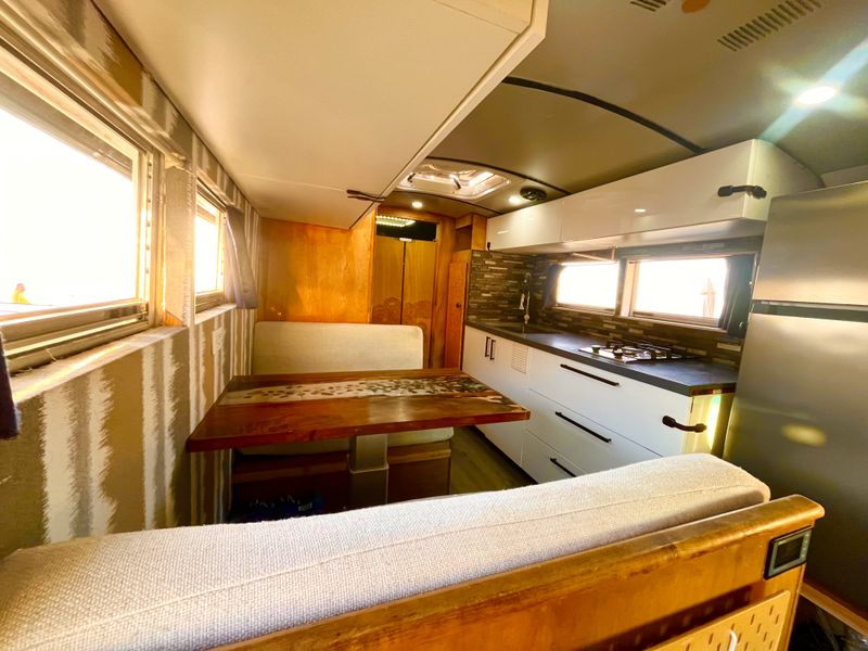 Picture 5/13 of a Off Grid Skoolie with XL bathroom— Roofdeck — LOW MILES for sale in San Diego, California