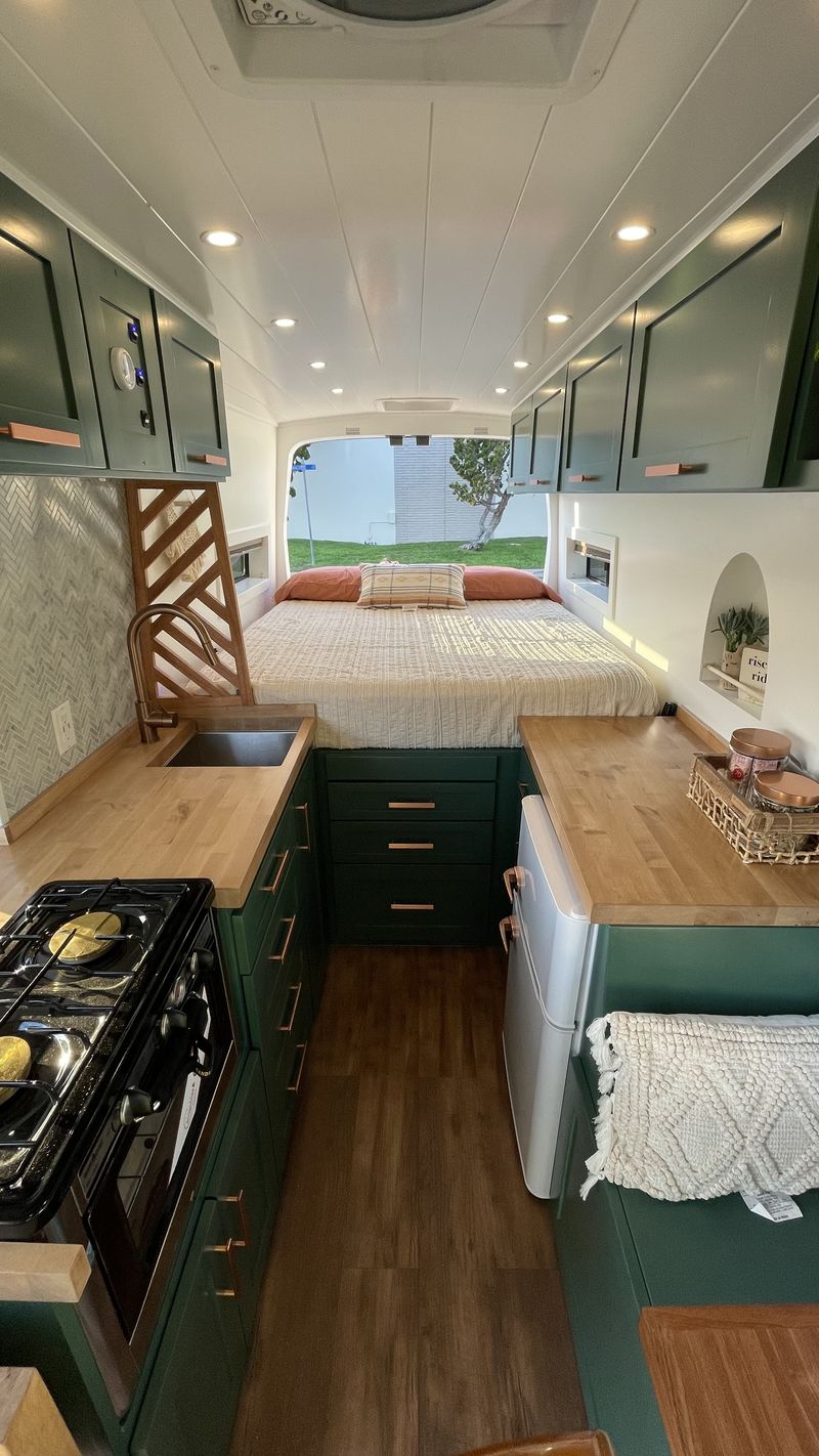 Camper Van For Sale: Only 24K Miles • Custom Interior • Queen Bed • 30