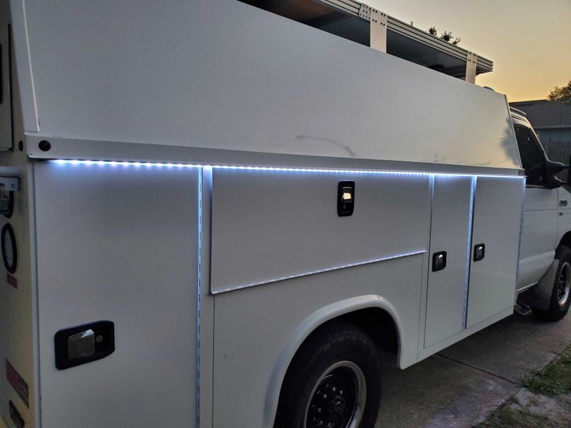 Picture 4/17 of a 2016 Ford E350 camper conversion. 60k miles for sale in Saint Petersburg, Florida