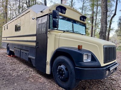 Photo of a Skoolie for sale: Luxury Off-Grid Skoolie Conversion