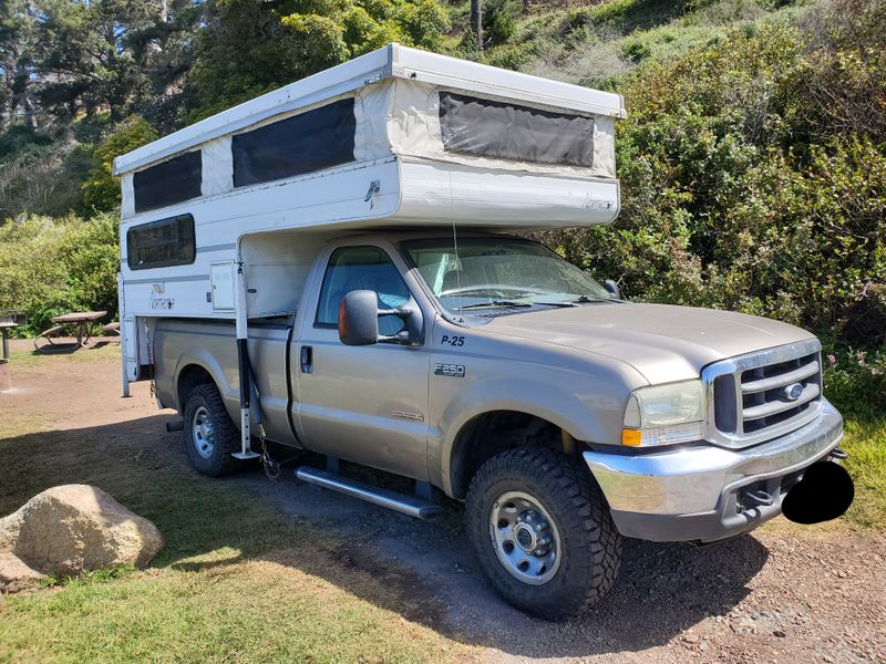 Picture 1/22 of a 04 F-250 4WD w/ pop up truck camper for sale in Seattle, Washington