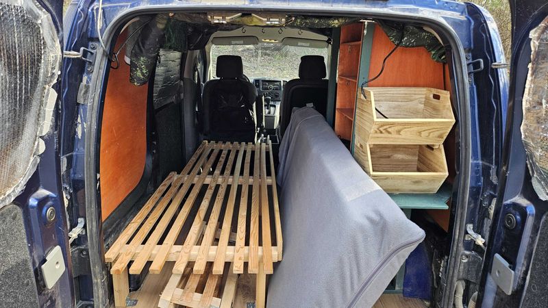 Picture 4/9 of a 2014 Nissan micro camper with solar for sale in East Flat Rock, North Carolina