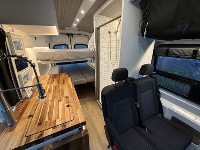 Photo of a Camper Van for sale: 2023 Ford Transit 350 HD Ecoboost AWD Seats/Sleeps 4, 880W