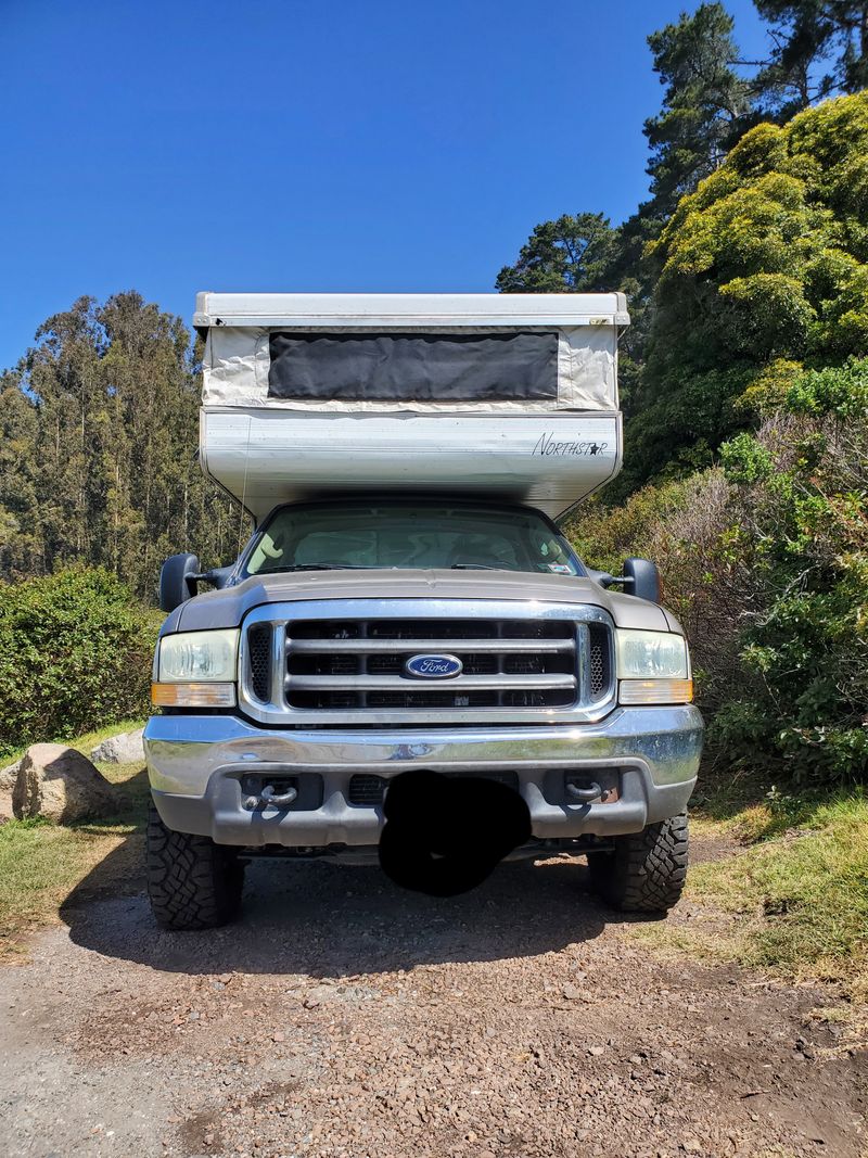 Picture 2/22 of a 04 F-250 4WD w/ pop up truck camper for sale in Seattle, Washington