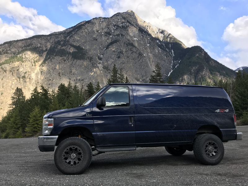 Picture 1/12 of a Ford E-350 QUIGLEY 4X4  for sale in Denver, Colorado